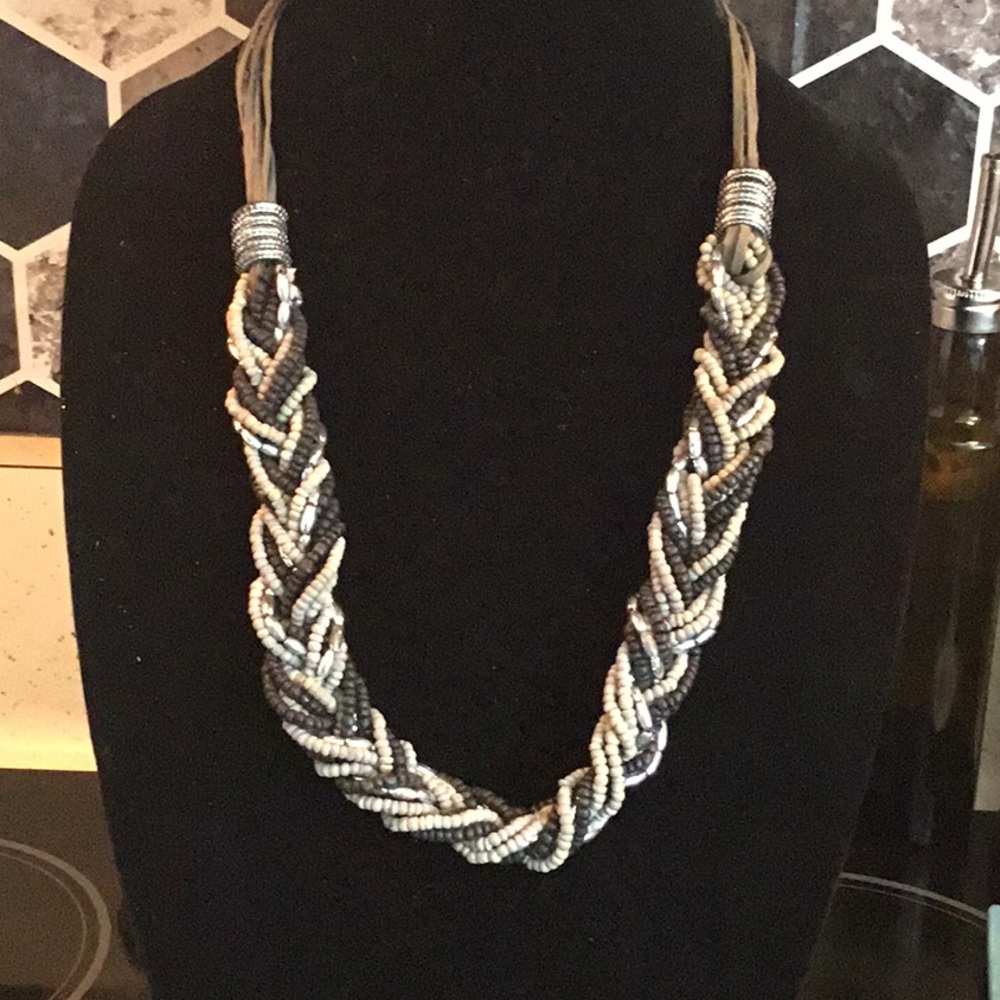 Multi strand, and leather beaded necklace